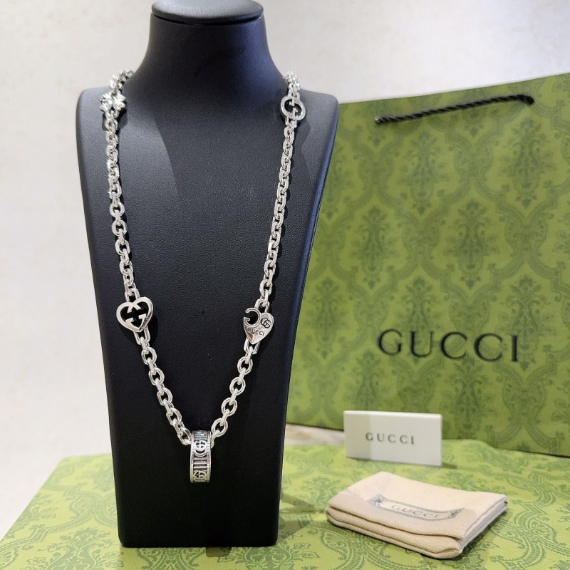 G*u*i necklaces